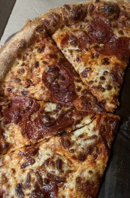 Domino's overcooked burned Hand Tossed Pepperoni Pizza with extra cheese