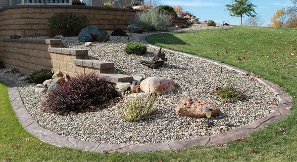 Border magic edging, Retaining wall, landscape rock and plants