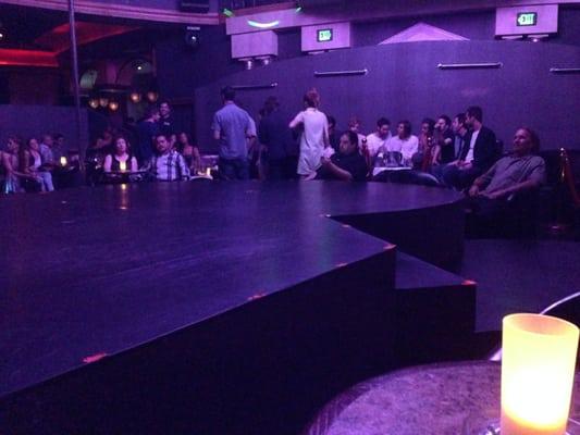 There are VIP tables against that wall and the dancers sometimes work the bars behind the booths.