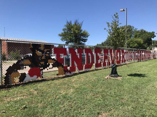 LINC and YPAL volunteers installed this cool fence mural to welcome the kids back to school.