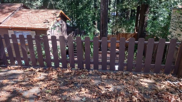 Rebuilt old fence after car went through it.