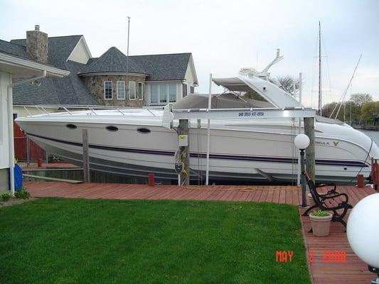 4-Pole Top Mount Boat Lift, with flat plate gear units and a Gem 2 Remote.