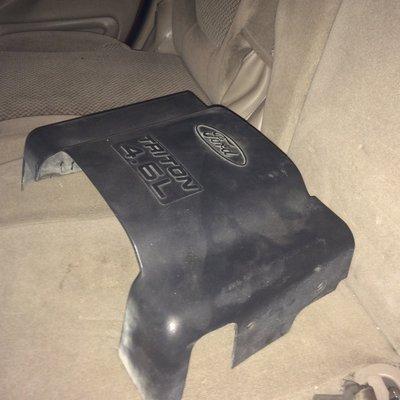 THEY LEFT THE COVER TO THE FUEL INTECTION IN MY BACK SEAT!!!