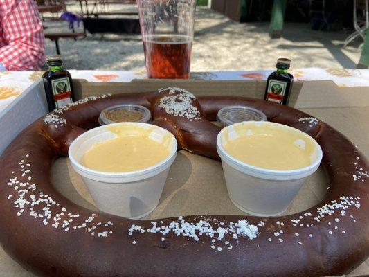 1 giant pretzel with cheese and mustard sauces. (plus 2 shots of Jeiger)