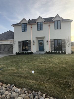 Copper gutters and downspouts