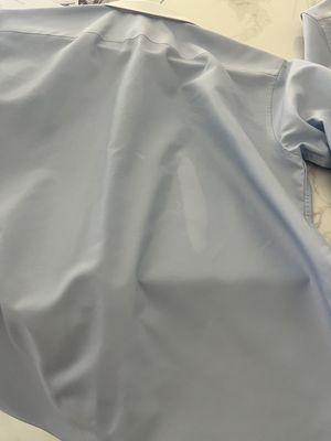 Dress shirt that had no stains came back with large bleach stains