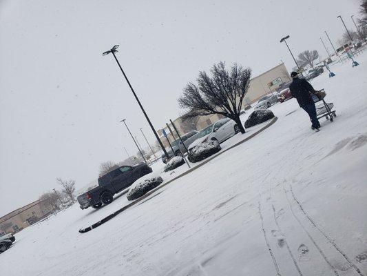 Snow packed Albertsons parking lot on New Years Day