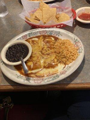 Cheese enchiladas, Mexican Rice, and black beans (free chips and salsa, also)