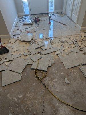 Tearing out tile in foyer