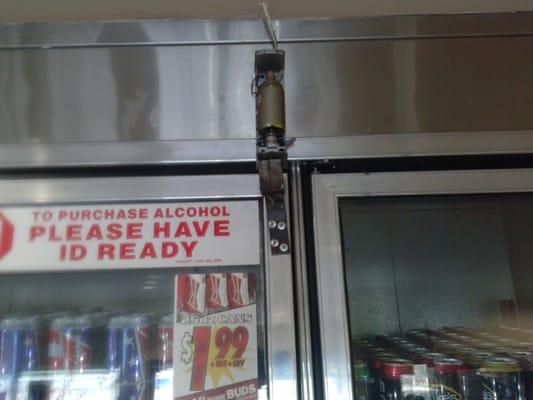 Beer cooler is LOCKED DOWN, i didnt kno & the nice lady behind bullet proof glass was yelling "STOP, let me open it for you!