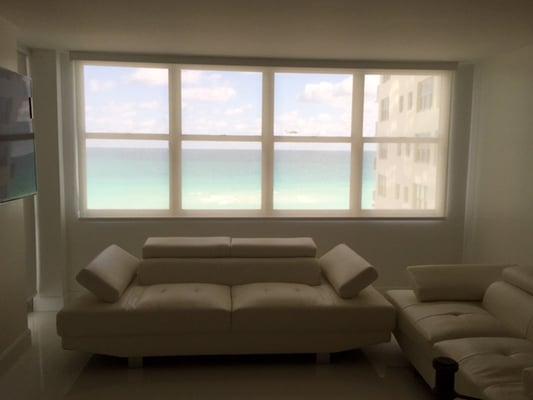 Perfect for any condo.  These shades allow light in while maintaining your privacy.