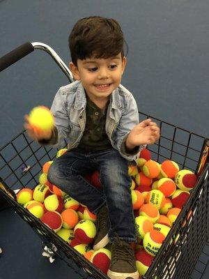 The cutest ball boy you'll ever see!