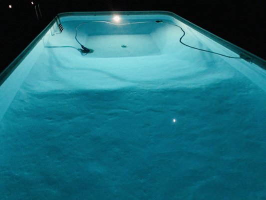 Pool at night showing undulations on pool floor! Finished May 15, 2021!