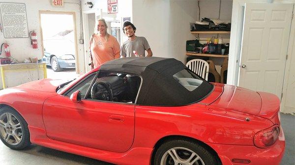 Another customer happy with her new top on her Mazda Miata!