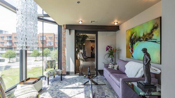 Two-story glass chandelier in sitting room