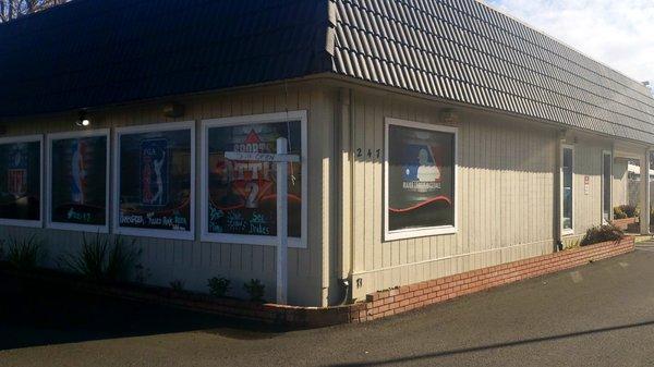 Their building as you are driving east on Perkins. These days you enter from the back.