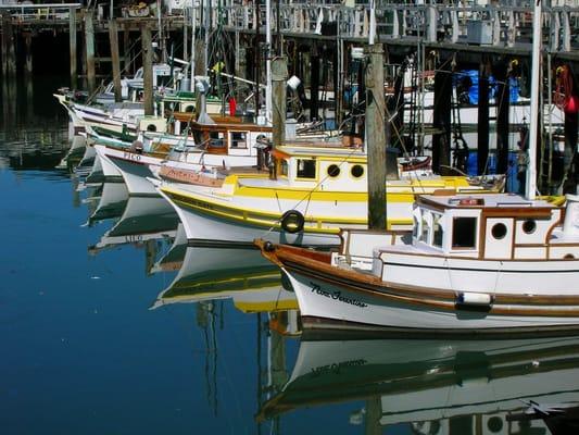 Something about still water and boats. By Fisherman's Wharf in Frisco.