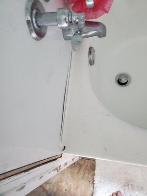 Obviously no caulking is included in installation