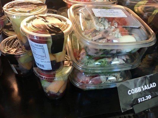 Farmers Market sign says "salads." Here are the salads: Fruit salad or "Cobb" Salad (w/ cubes of ham).  Better to get the Cobb to go at CPK.