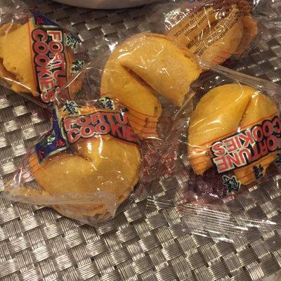 Complimentary fortune cookies.. the one on the middle had two in one wrapper but the wrapper was open