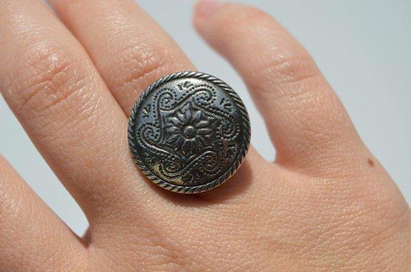 This is a pewter button from the early 1980s that was my very first ring I created.