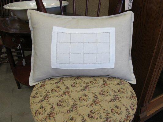 Pillow adorned with antique doily...nice!