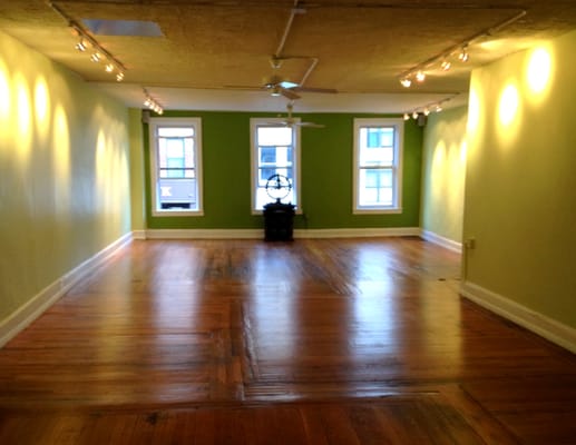 Beautifully sunlit spacious yoga practice room