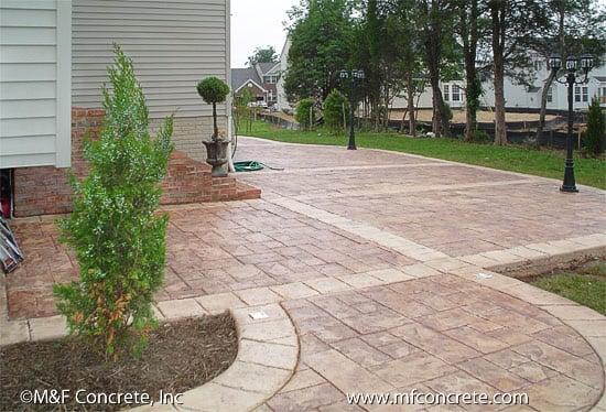 Stamped Concrete patio and walkway by M & F Concrete.