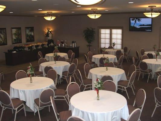 The large repast room with state of the art sound and video systems and catering station