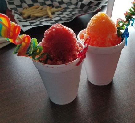 A cherry sour snowcone, and what we have loving dubbed the Fuzzy Monkey (peach and pineapple) with an airhead extreme for zing!