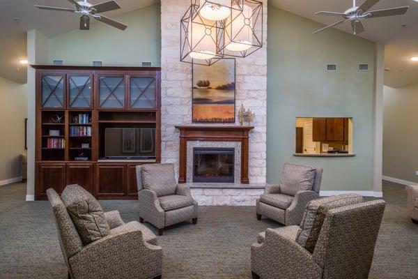 Our living room is very cozy with its' fireplace and stylish recliners.