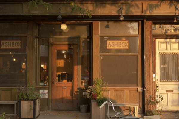 Storefront, early evening.