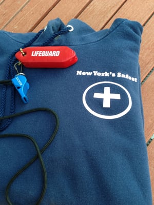 Pictured here is The front of The New York's Safest original lifeguard gear hoody.