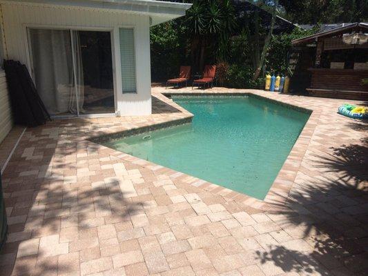 Brick pavers on pool deck after pressure cleaning