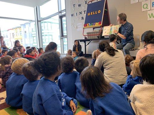 The Pre-K 3's visit the North Beach Library for story time with Mr. Sean.