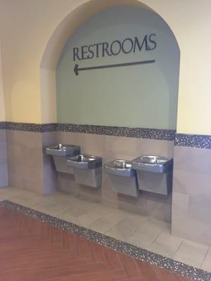 The restrooms are inside the food court.