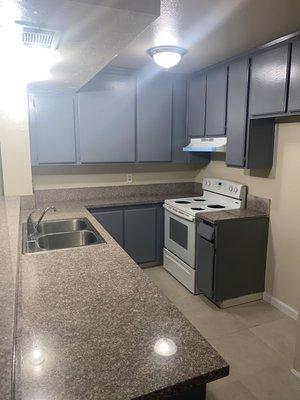 Kitchen area in a 2bd/2ba unit.