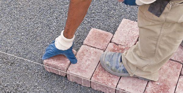 We meticulously install and repair paver driveways and patios.