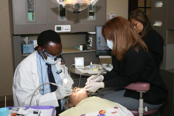 Dr. Omido working on a patient