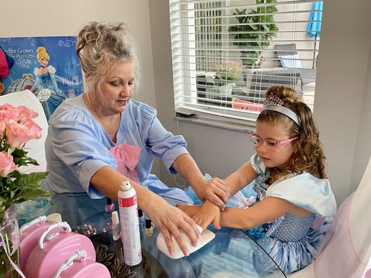 Gwen as the Fairy Godmother did all the girls nails.