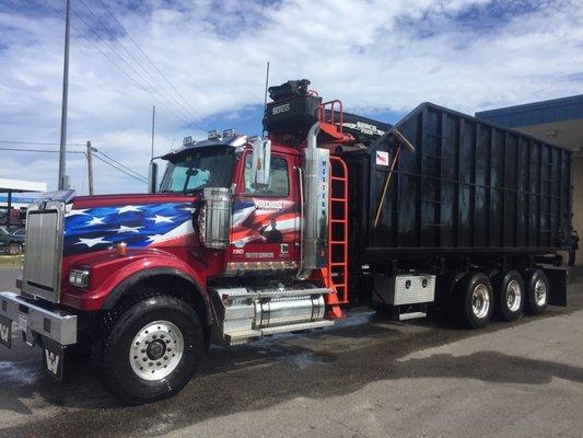 Our Debris/Brush Truck..Self Loading with Knuckle Boom Grapple Attached. Good For Storm Clean ups!!