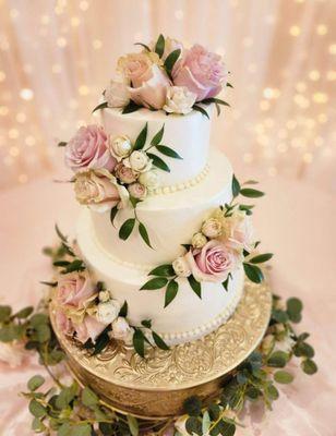 Pretty flowered simple wedding cake 3 tier.