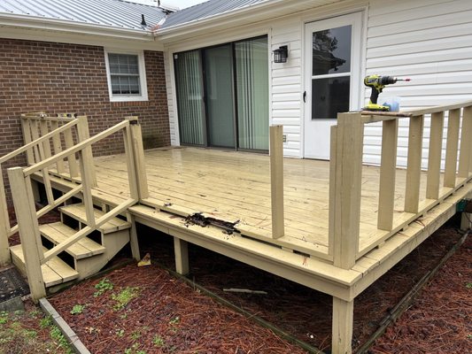 deck rot being repaired and replaced with new severe weather treated lumber