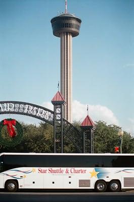 SAtown touring, done right.  Christmastime, downtown San Antonio.  Tower of Americas.  One of Star Shuttle's big charter buses.