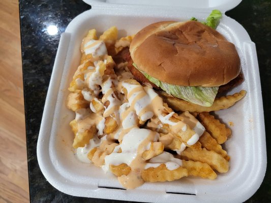 Fried chicken sandwich with crinkle fries (O added my own sauce)