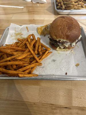 Indulgent BBQ burger with sweet potato fries