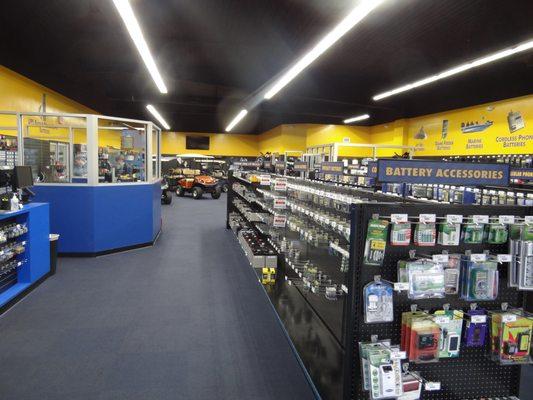 A great showroom full of batteries, golf cars, and golf car parts and accessories!