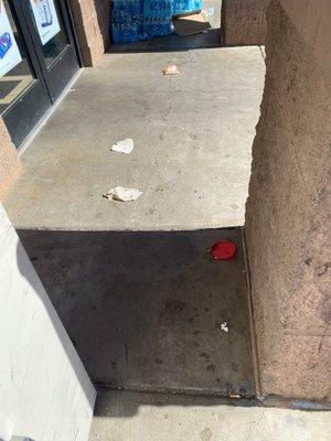 Step over garbage to enter