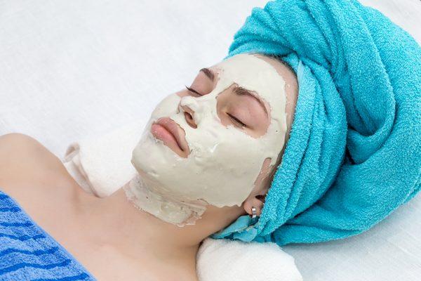 Facial treatment and clay mask for reducing wrinkles.