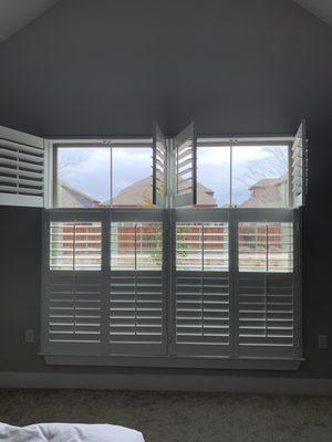 Bedroom double hung shutters